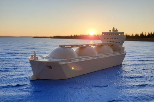 A model of an N Scale LNG Transport Ship on a model train layout