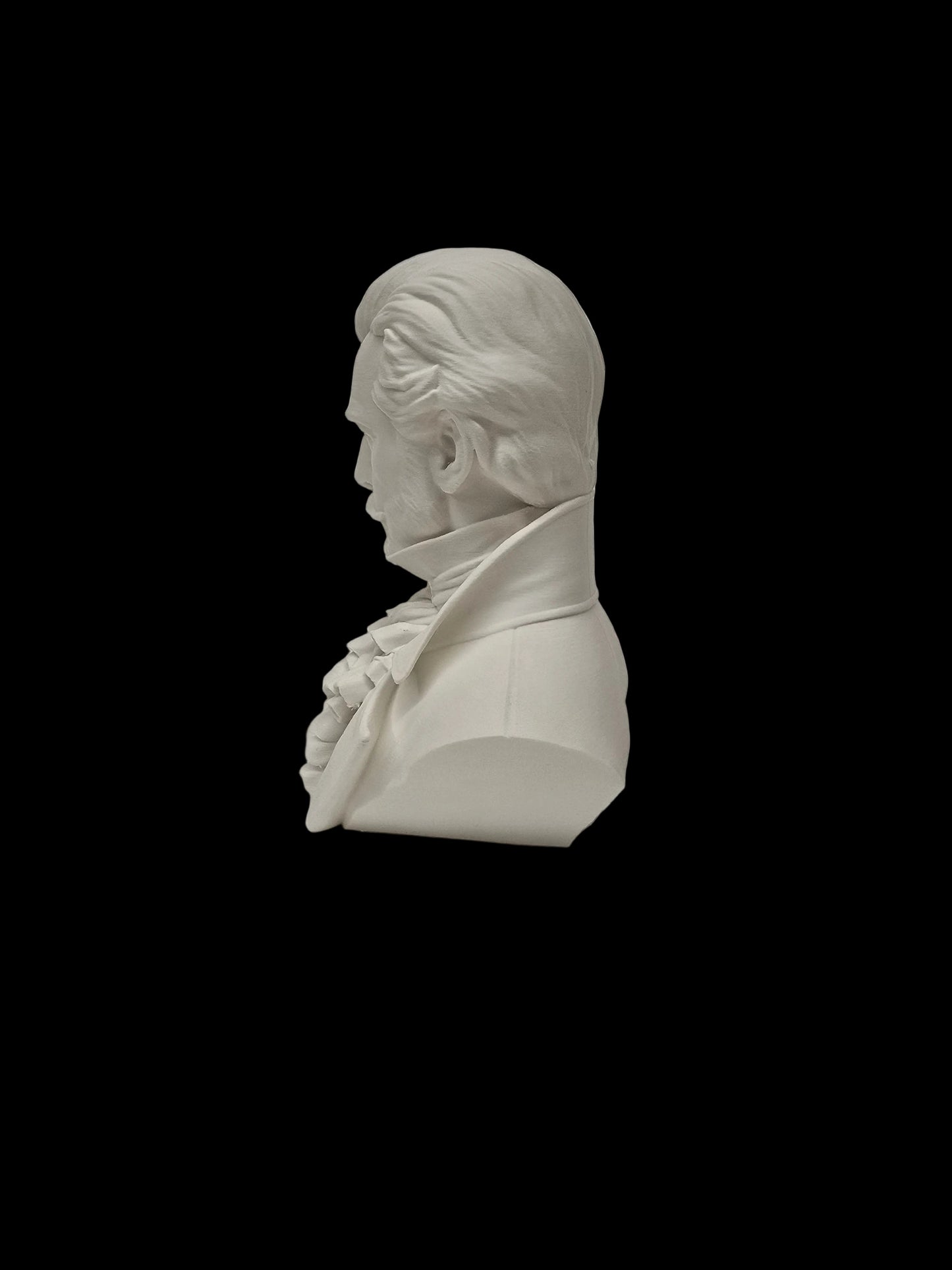 A white resin or ceramic bust sculpture of a historical man in profile, shown on a textured white surface against a white background.