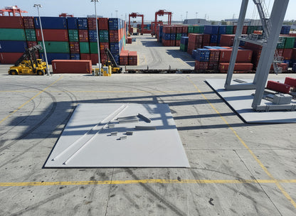 Gray metal rods on a textured white surface