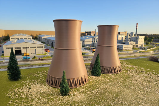 Model of two cooling towers with a scenic background