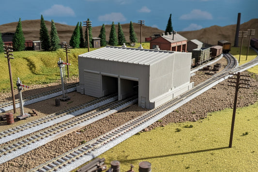 A model of a model on a train layout table.